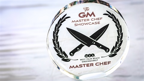 Glass trophy with black and gold inscription: The West Palm Beach GreenMarket Master Chef Showcase Master Chef